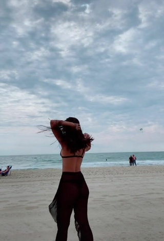 4. Hot Virgie Ann Casteel in Black Bikini Top at the Beach