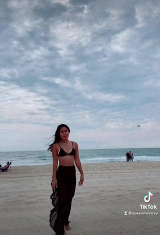 5. Sexy Virgie Ann Casteel in Black Bikini Top at the Beach