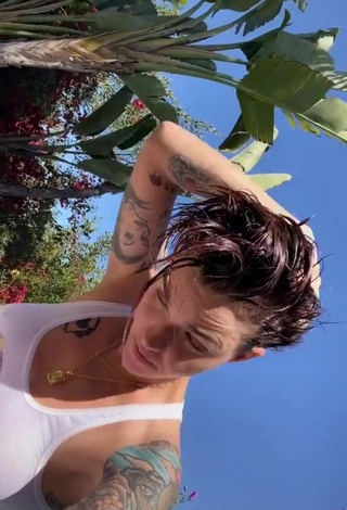 3. Sultry Ruby Rose in White Top