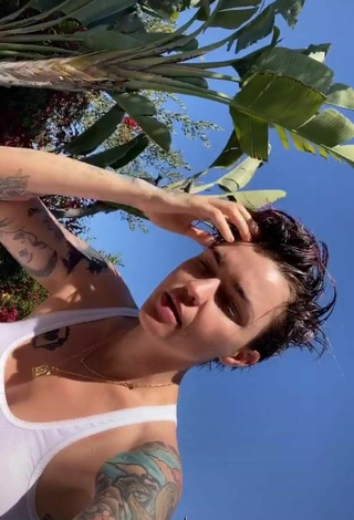 6. Sultry Ruby Rose in White Top