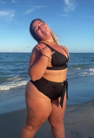 2. Erotic Sam Paige Shows Cleavage in Black Bikini at the Beach