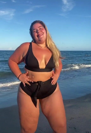 3. Erotic Sam Paige Shows Cleavage in Black Bikini at the Beach