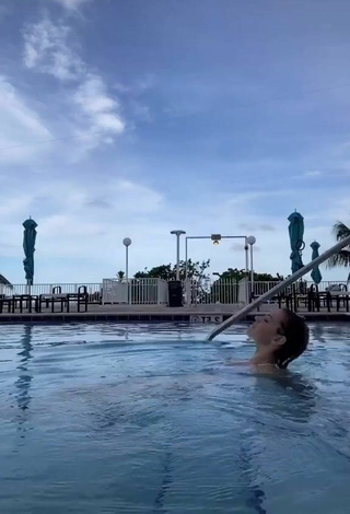 4. Pretty Sasha Ferro Shows Cleavage in White Bikini at the Pool