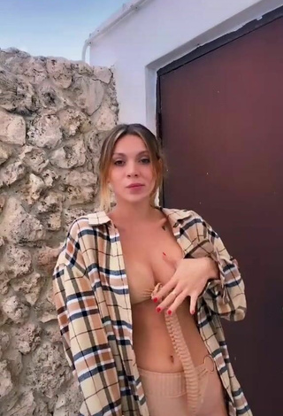 2. Amazing Sasha Ferro Shows Cleavage in Hot Beige Bikini