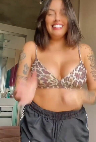 2. Titillating Vitoria Marcilio Shows Cleavage in Leopard Bikini Top