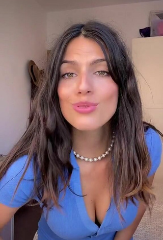 Luscious Paola Shows Cleavage in Blue Overall