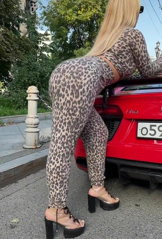 Titillating MIRAVI in Leopard Leggings in a Street