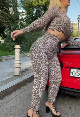 2. Titillating MIRAVI in Leopard Leggings in a Street