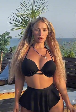 2. Titillating MIRAVI in Black Bikini