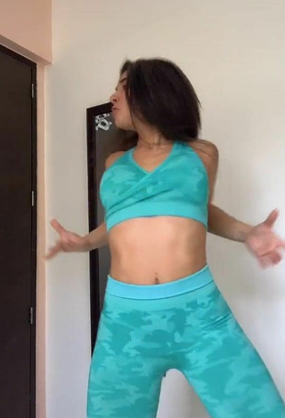 3. Titillating Adriana Daabub in Turquoise Leggings