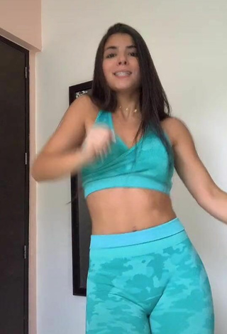 6. Titillating Adriana Daabub in Turquoise Leggings