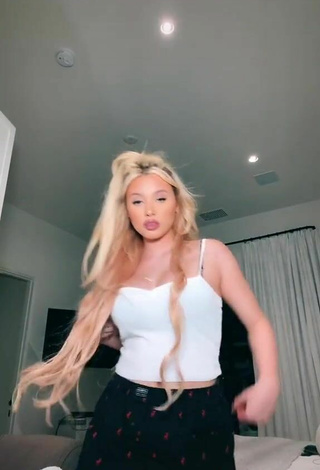 Sultry Alabama Barker Shows Cleavage in White Crop Top and Bouncing Boobs