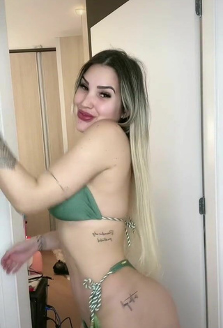 5. Sultry Alannis Proença Shows Cleavage in Green Bikini