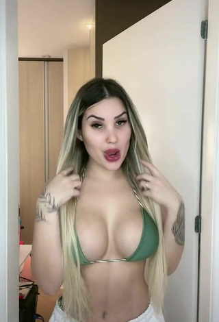 2. Sexy Alannis Proença Shows Cleavage in Green Bikini Top