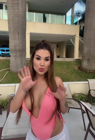 4. Sultry Alannis Proença Shows Cleavage in Pink Swimsuit (Side Boob)