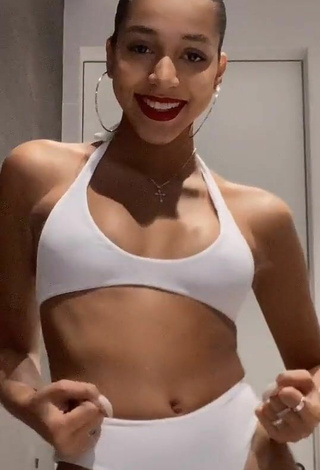 2. Sultry Alisha Kone Shows Cleavage in White Bikini