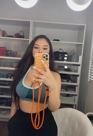 Sultry Alondra Ortiz Shows Cleavage in Sport Bra