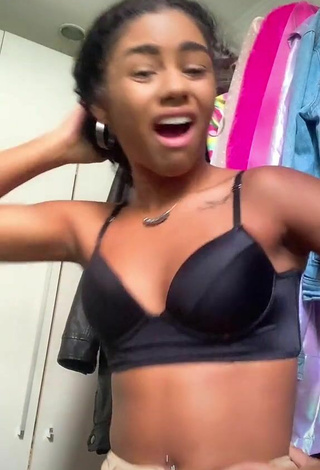 2. Sexy Angel Oficial Shows Cleavage in Black Bra