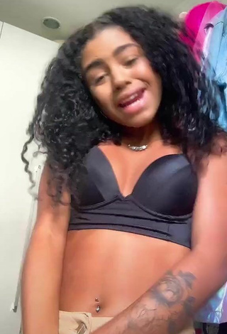 3. Sexy Angel Oficial Shows Cleavage in Black Bra