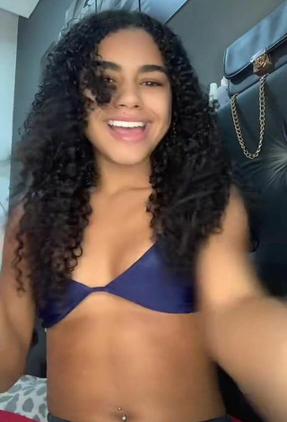 Sexy Angel Oficial Shows Cleavage in Bikini Top