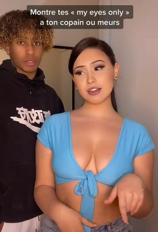 6. Erotic Anissa Shows Cleavage in Blue Crop Top