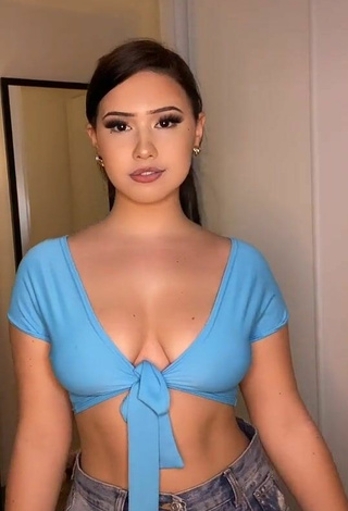 3. Alluring Anissa Shows Cleavage in Erotic Blue Crop Top