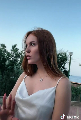 5. Sultry Anna Ciati Shows Cleavage in White Top