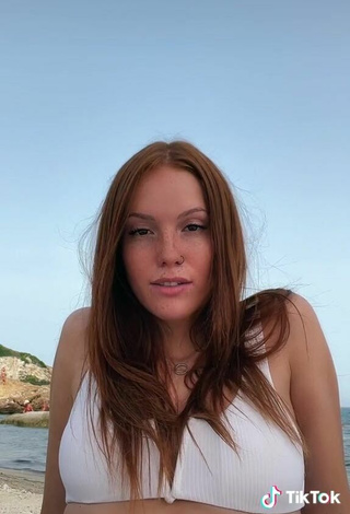 6. Sultry Anna Ciati Shows Cleavage in White Bikini Top