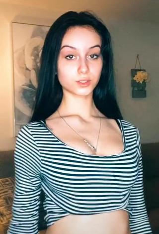 Luscious Arianna Roman Shows Cleavage in Striped Crop Top