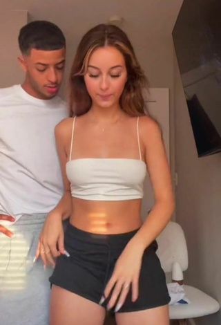 4. Sultry Arianna Roman in White Crop Top