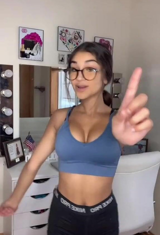 Titillating Ava Justin Shows Cleavage in Sport Bra