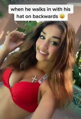 2. Sultry Ava Justin Shows Cleavage in Red Bikini Top