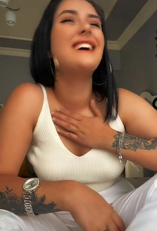 3. Sultry Büşra Kartal Shows Cleavage in White Top