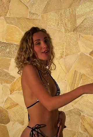 4. Titillating Carlotta Fiasella Garbarino Shows Cleavage in Zebra Bikini