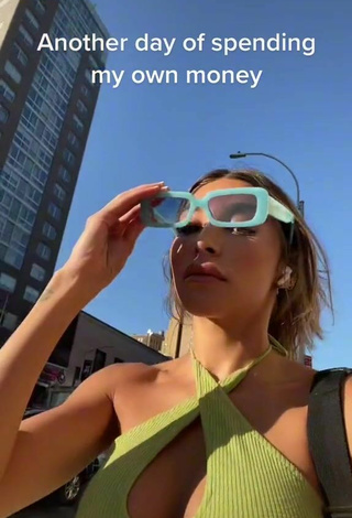 Sweetie Chantel Jeffries Shows Cleavage in Lime Green Crop Top in a Street