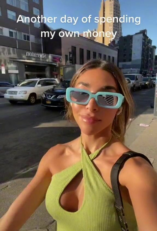 4. Sweetie Chantel Jeffries Shows Cleavage in Lime Green Crop Top in a Street