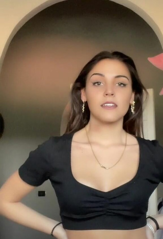 Luscious Clarissa Rotelli Shows Cleavage in Black Crop Top