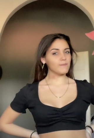 3. Luscious Clarissa Rotelli Shows Cleavage in Black Crop Top