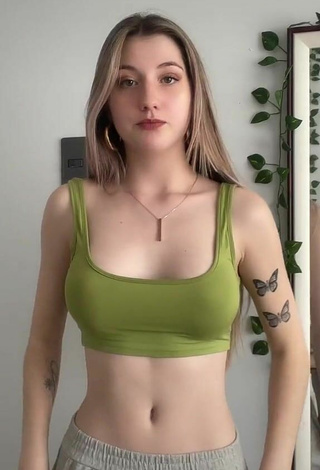 Sexy Constanza Javiera Shows Cleavage in Green Crop Top