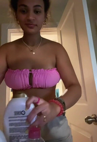 4. Sultry Corinne Carr Shows Cleavage in Pink Bikini Top (Side Boob)