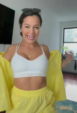 4. Sultry Deanna Giulietti Shows Cleavage in White Crop Top