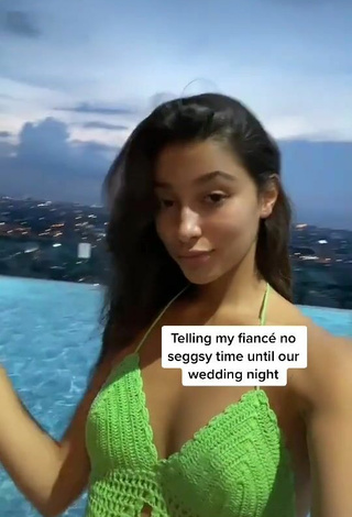 2. Sultry Kaory Desole Shows Cleavage in Green Crop Top