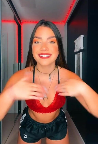 Sultry Duda Kropf Shows Cleavage in Red Bra