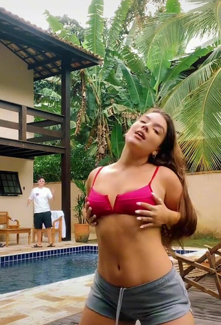 4. Hot Duda Kropf Shows Cleavage in Pink Bikini Top