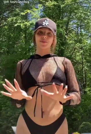 4. Sexy Eliza Minor Shows Cleavage in Black Bikini