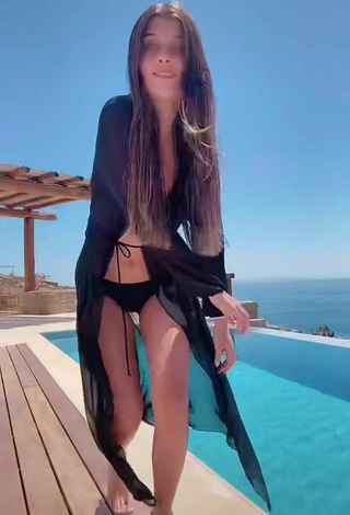 4. Sultry Kasia Bożek Shows Cleavage in Black Bikini