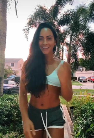 2. Luscious Gabi Butler Shows Cleavage in Sport Bra in a Street