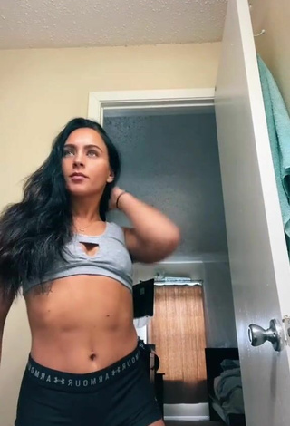 5. Sultry Gabi Butler Shows Cleavage in Grey Sport Bra (Side Boob)