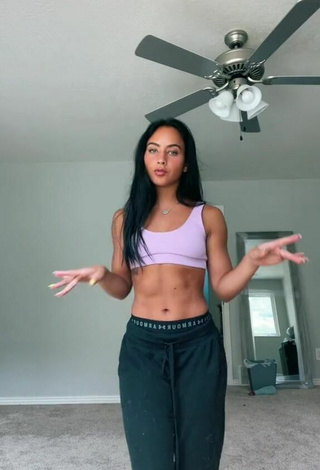 Sexy Gabi Butler Shows Cleavage in Violet Sport Bra