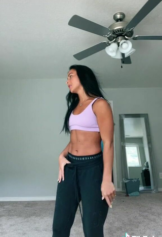 3. Sexy Gabi Butler Shows Cleavage in Violet Sport Bra